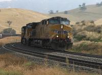 UP 5757 drifts downgrade with a manifest freight on the Bealville siding.